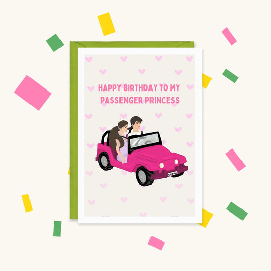Greeting card of a couple in a pink jeep, man driving, with pink hearts: "Happy birthday to my passenger princess"