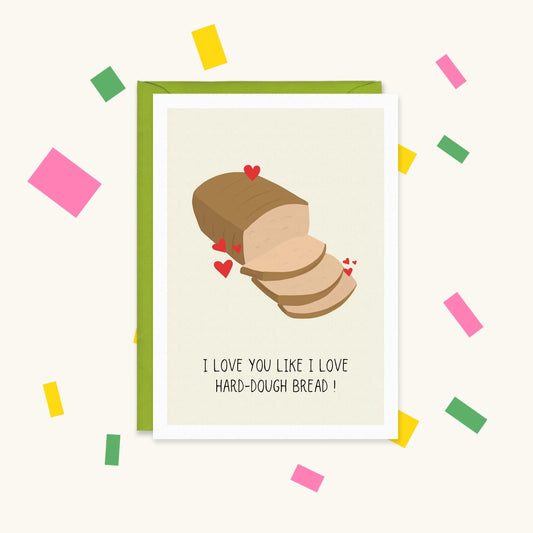 Greeting card of a sliced hard dough bread loaf with red hearts and text "I love you like I love hard-dough bread!"