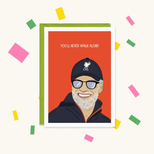 Greeting card of a smiling Jürgen Klopp in an LFC cap and glasses on red, text "You'll Never Walk Alone!"