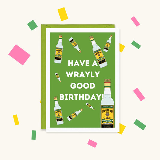 Greeting card with Wray & Nephew style white overproof rum bottles on green, reading "Have a wrayly good birthday!"