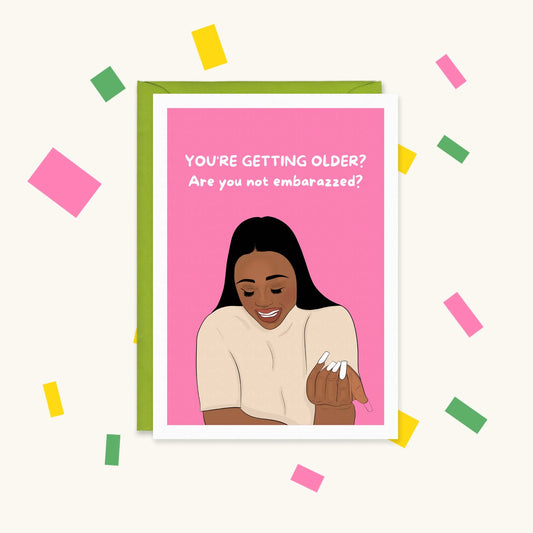 Greeting card with an illustration of Nella Rose admiring her long white nails: "You're getting older? Are you not embarazzed?"