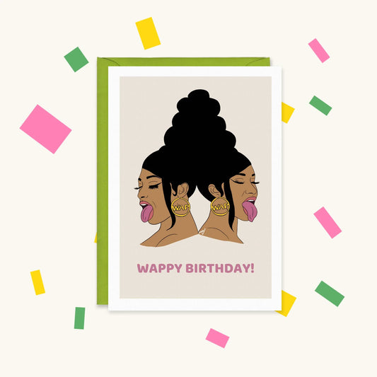 Greeting card of two women back to back with high buns, tongues out and WAP hoop earrings, text 'Wappy Birthday!'