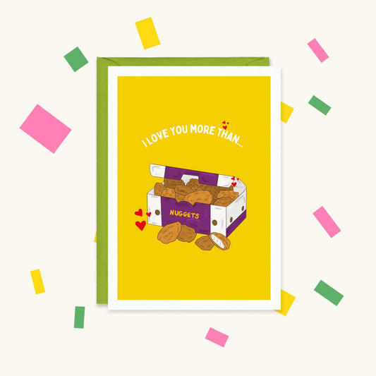 Greeting card with an open box of chicken nuggets and red hearts on yellow, reading "I love you more than... nuggets"