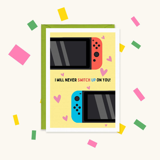 Greeting card with red and blue Nintendo Switch halves and pink hearts on yellow, reading "I will never switch up on you!"