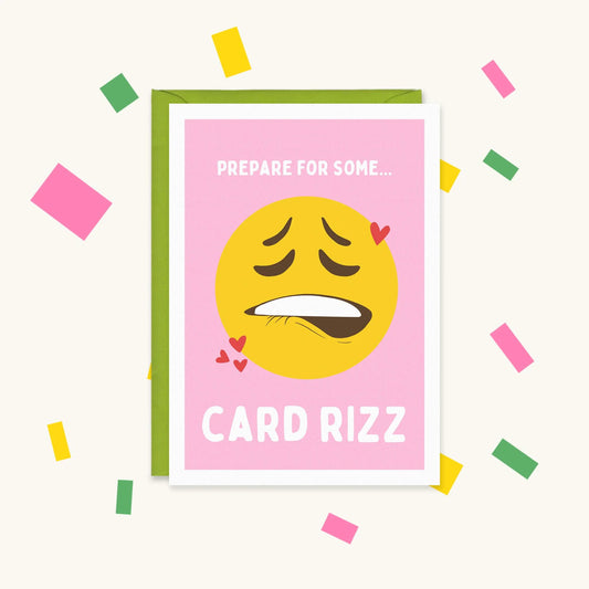 Greeting card with a lip-biting yellow emoji and red hearts on pink, reading "Prepare for some... Card Rizz"