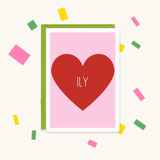 Greeting card with a big red heart on a pink background and the letters "ILY" in white handwritten text