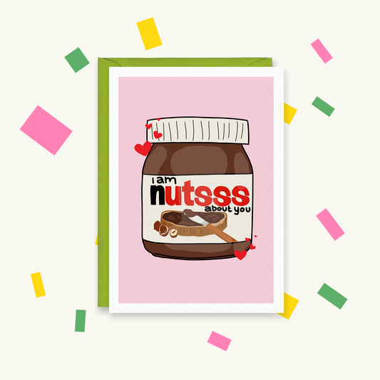 Greeting card with an illustrated Nutella-style jar and hearts on pink, reading "i am nutsss about you"