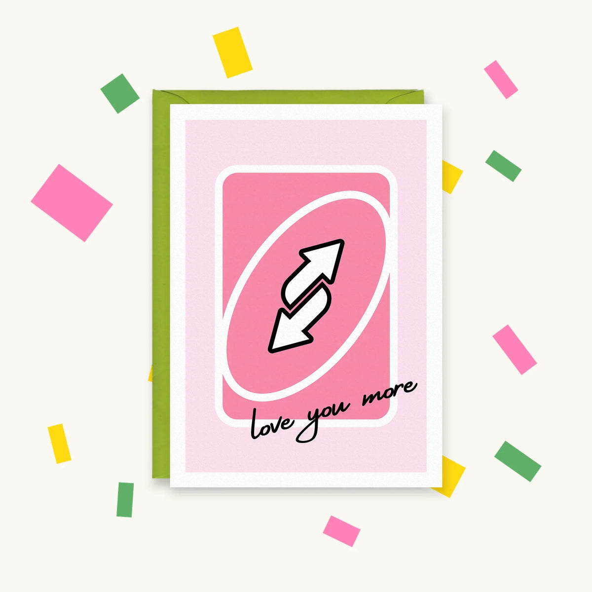 Greeting card showing a pink Uno reverse card with swapping arrows and the handwritten words "love you more"
