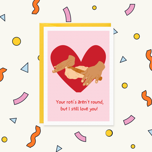 Greeting card of hands rolling roti dough on a red heart, text: "Your roti's aren't round, but I still love you!"