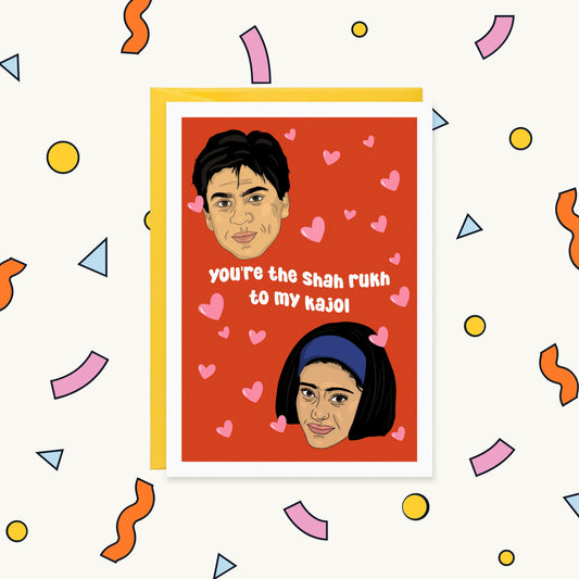 Greeting card with illustrated Shah Rukh Khan and Kajol among pink hearts: "you're the Shah rukh to my kajol"