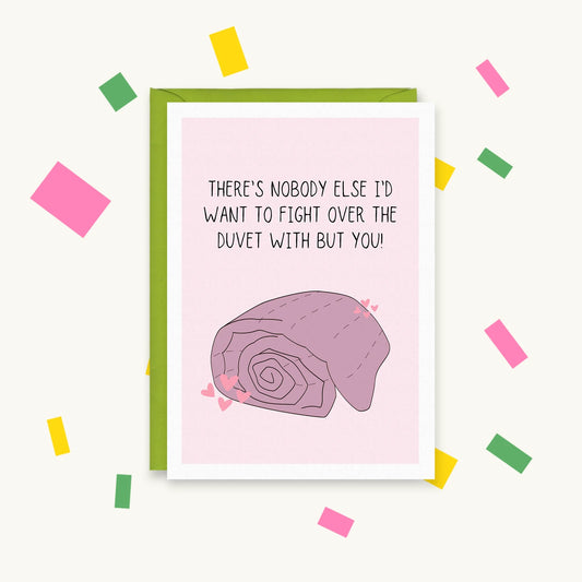 Greeting card of a rolled-up pink duvet with hearts: "There's nobody else I'd want to fight over the duvet with but you!"