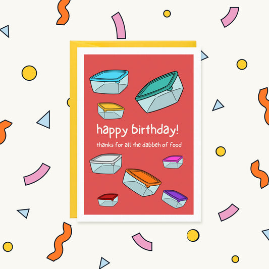 Greeting card with colourful plastic food containers on red, reading "happy birthday! thanks for all the dabbeh of food"