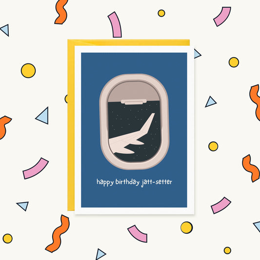 Greeting card with a plane window showing a wing against a starry night sky and the text "happy birthday jatt-setter"