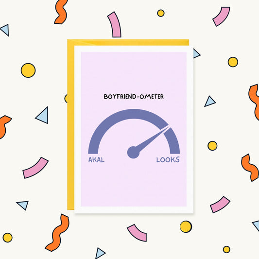 Greeting card with a gauge reading 'Boyfriend-ometer', needle pointing far from 'Akal' towards 'Looks'