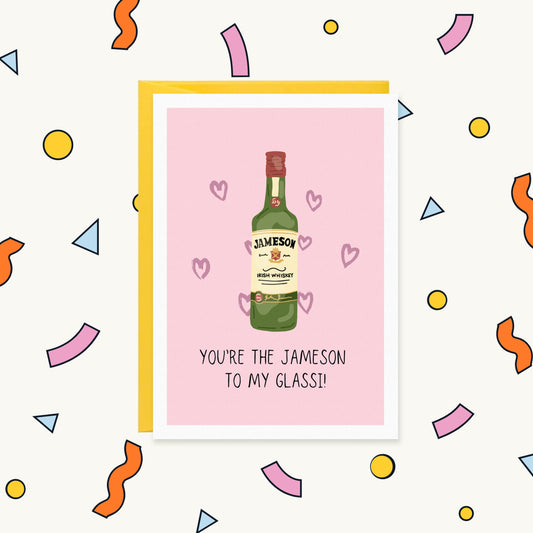 Greeting card with a Jameson Irish whiskey bottle and pink hearts on pink, reading "You're the Jameson to my glassi!"