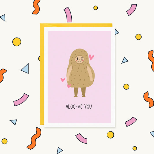 Greeting card of a smiling person in a potato costume with pink hearts on a pink background, reading "ALOO-VE YOU"