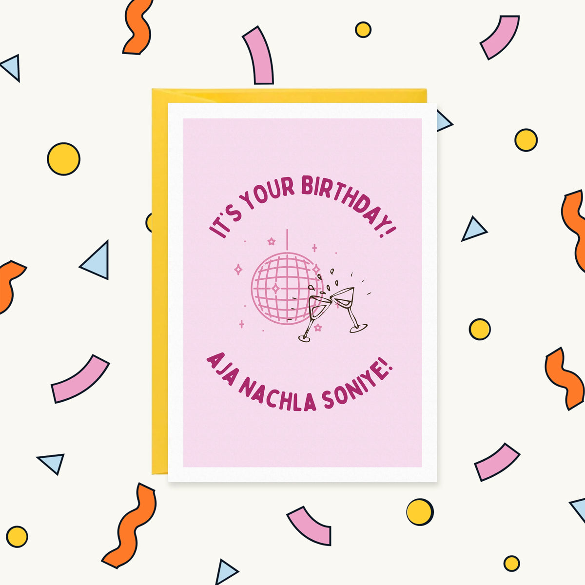 Greeting card with a pink disco ball and clinking glasses, reading "It's your birthday! Aja nachla soniye!"